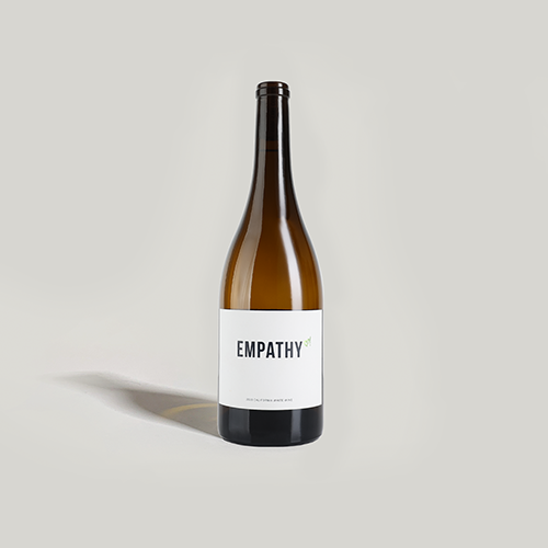 A bottle of 2019 EMPATHY WHITE on a light gray background